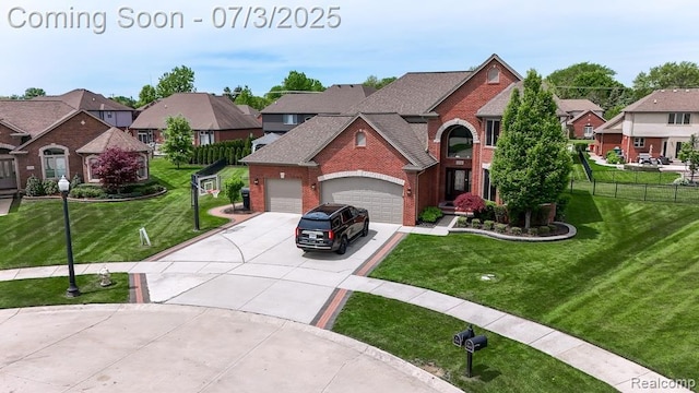 15330 Prentice Ct, Macomb, MI 48042 - view of front of property featuring brick siding, concrete driveway, an attached garage, and a residential view