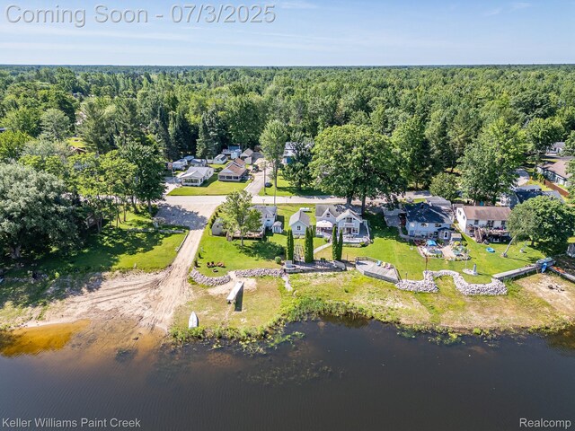 1379 Sioux St, Gladwin, MI 48624 - aerial view of property's location featuring a heavily wooded area and nearby suburban area