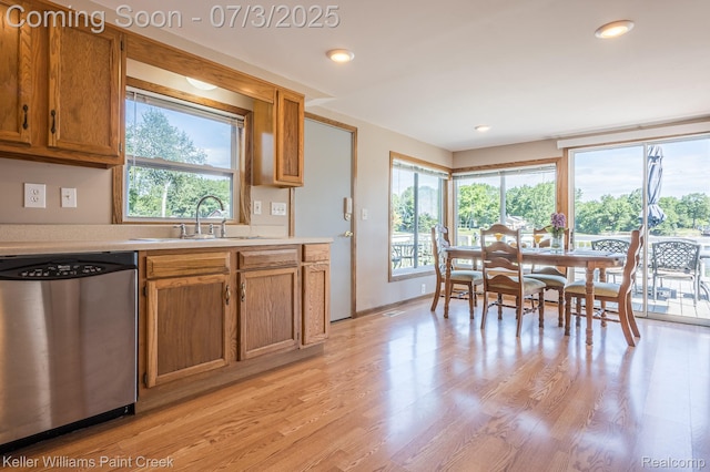 1379 Sioux St, Gladwin, MI 48624 - kitchen featuring dishwasher, light countertops, light wood finished floors, brown cabinetry, and recessed lighting
