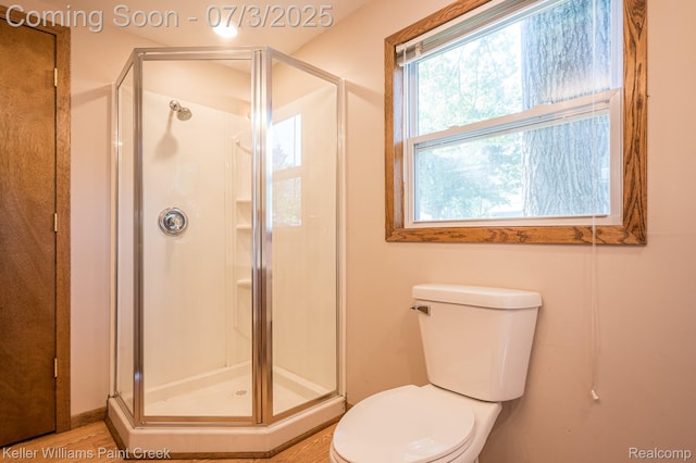 1379 Sioux St, Gladwin, MI 48624 - bathroom with toilet and a stall shower