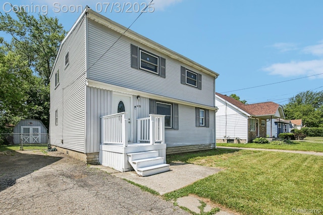 1472 Ready Ave, Burton, MI 48529 - view of front facade with a shed and board and batten siding