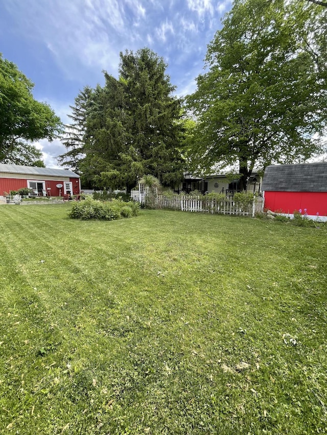 8441 Homerich Ave, Byron Center, MI 49315 - view of yard featuring an outbuilding