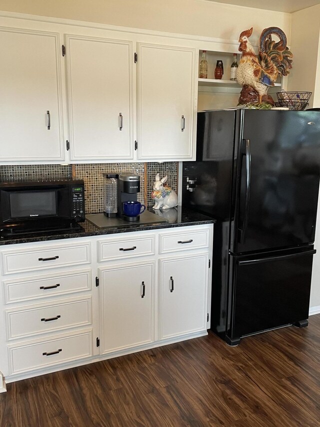 8441 Homerich Ave, Byron Center, MI 49315 - kitchen with black appliances, white cabinets, dark wood-style flooring, and decorative backsplash
