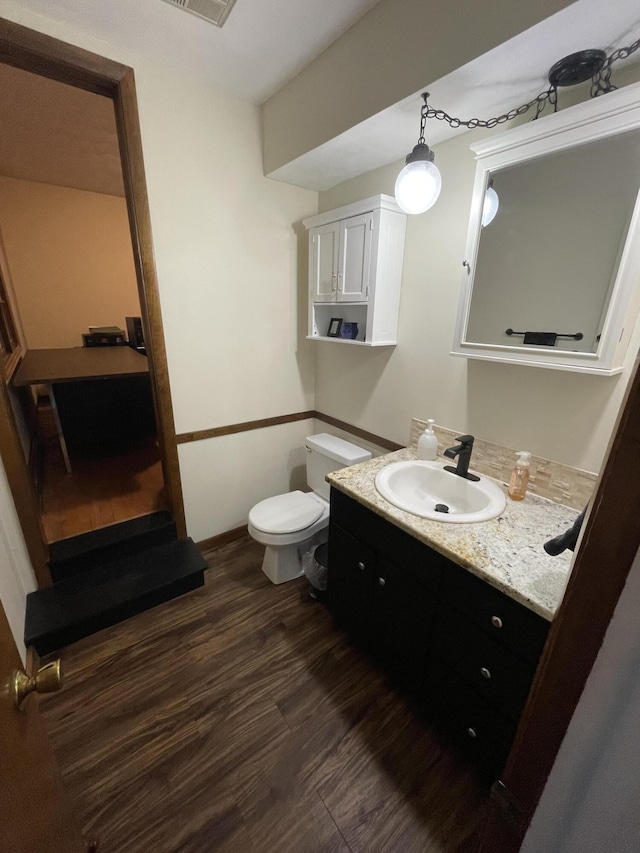 8441 Homerich Ave, Byron Center, MI 49315 - bathroom with vanity and wood finished floors