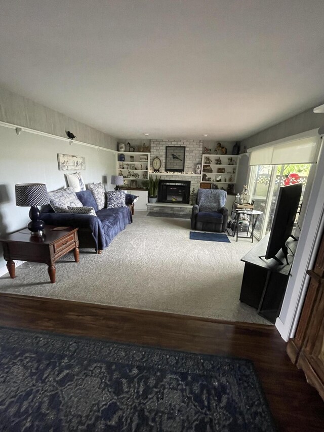 8441 Homerich Ave, Byron Center, MI 49315 - living area featuring wood finished floors and a fireplace