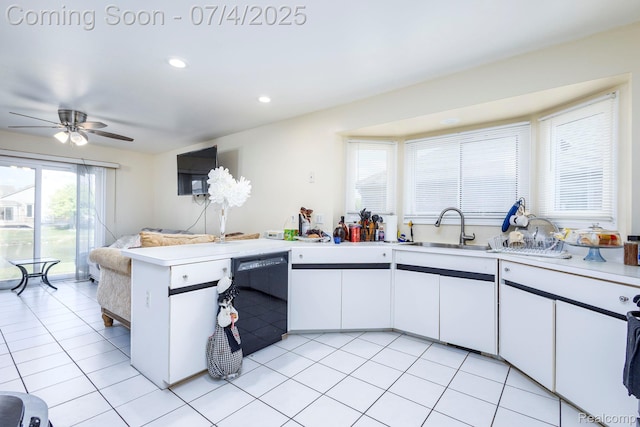 52448 Cedar Mill Dr, Macomb, MI 48042 - kitchen featuring black dishwasher, light countertops, white cabinetry, a peninsula, and recessed lighting