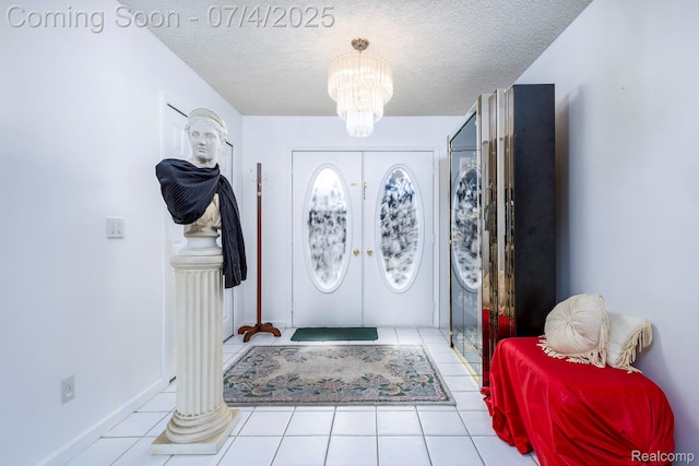 52448 Cedar Mill Dr, Macomb, MI 48042 - entrance foyer featuring a chandelier, a textured ceiling, tile patterned floors, and french doors