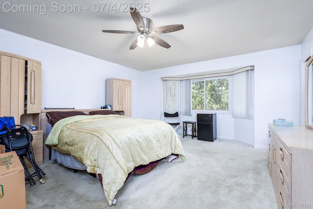 52448 Cedar Mill Dr, Macomb, MI 48042 - bedroom featuring light carpet, a textured ceiling, and a ceiling fan