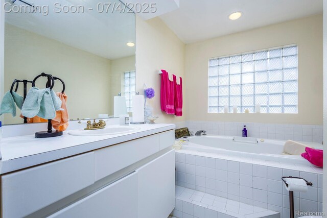 52448 Cedar Mill Dr, Macomb, MI 48042 - full bath with vanity, a garden tub, and recessed lighting