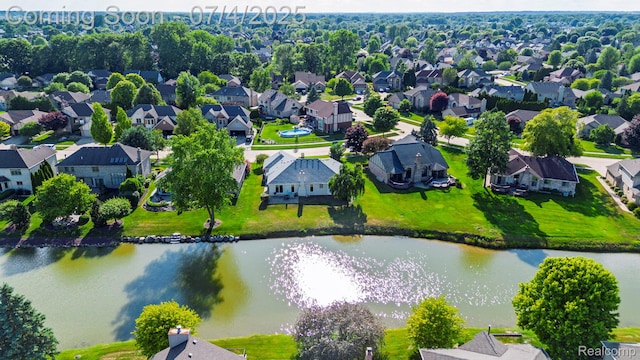 52448 Cedar Mill Dr, Macomb, MI 48042 - aerial perspective of suburban area featuring a nearby body of water