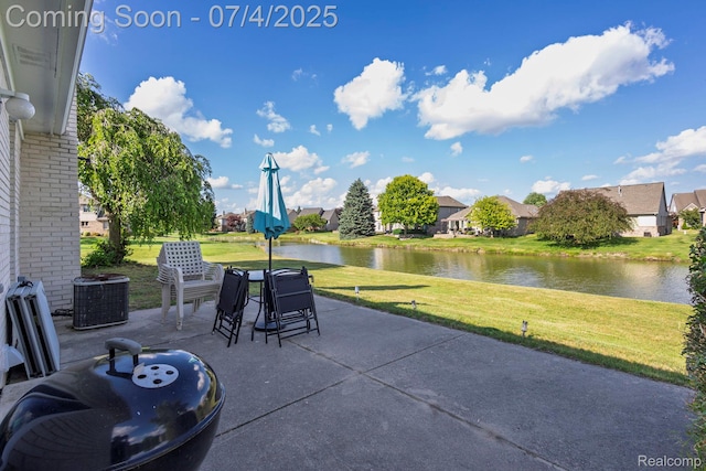 52448 Cedar Mill Dr, Macomb, MI 48042 - view of patio / terrace with a water view and a residential view