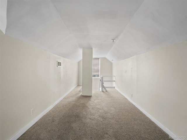 12667 Lauder St, Detroit, MI 48227 - additional living space featuring vaulted ceiling and carpet flooring