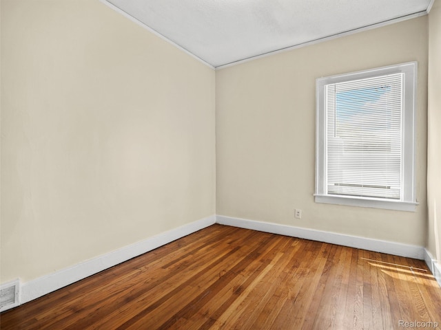 12667 Lauder St, Detroit, MI 48227 - spare room with hardwood / wood-style floors and ornamental molding