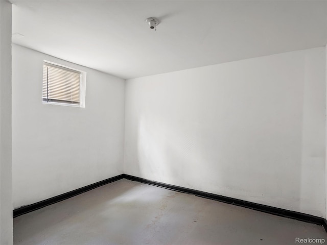 12667 Lauder St, Detroit, MI 48227 - empty room with concrete floors and baseboards