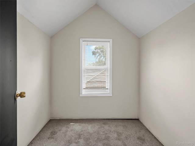 12667 Lauder St, Detroit, MI 48227 - unfurnished room with light colored carpet and vaulted ceiling