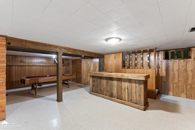 6494 W Coldwater Rd, Flushing, MI 48433 - indoor dry bar featuring tile patterned floors, wood walls, and billiards