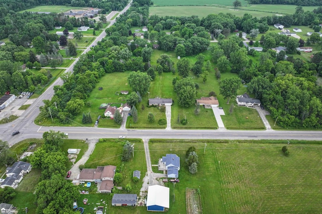6494 W Coldwater Rd, Flushing, MI 48433 - aerial view of property and surrounding area featuring a tree filled landscape
