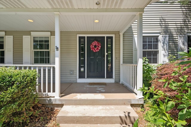 7987 36th St SE, Ada, MI 49301 - view of exterior entry with a porch