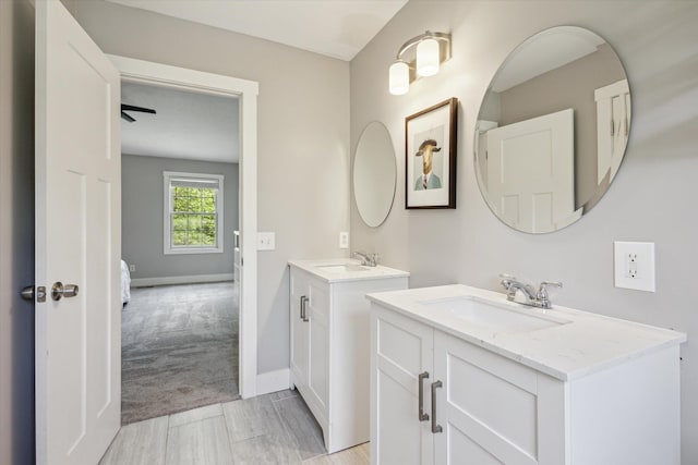 7987 36th St SE, Ada, MI 49301 - full bathroom with two vanities and baseboards