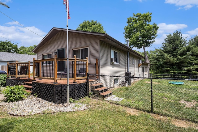 140 N 7th St NE, Cedar Springs, MI 49319 - rear view of property with a deck