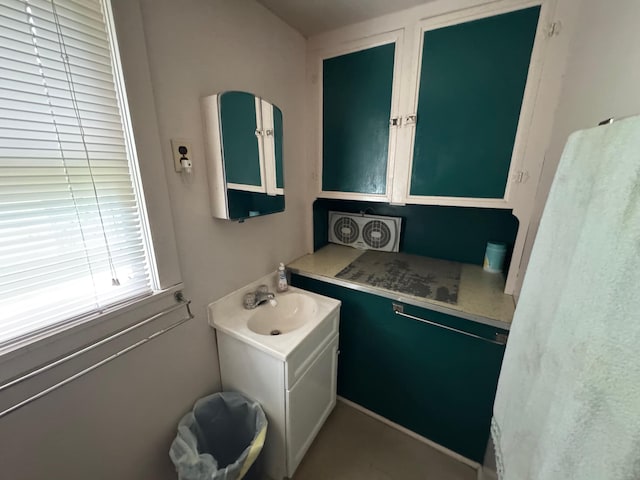 4231 W 5 Mile Rd, Irons, MI 49644 - bathroom with vanity