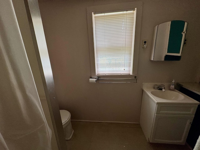 4231 W 5 Mile Rd, Irons, MI 49644 - bathroom featuring vanity and tile patterned flooring