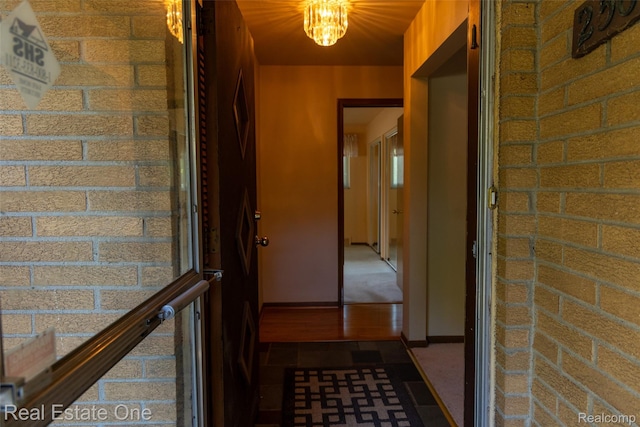 25640 Grand Concourse St, Southfield, MI 48075 - hall with a chandelier and baseboards
