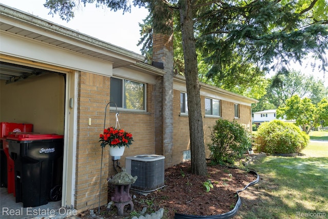 25640 Grand Concourse St, Southfield, MI 48075 - view of side of home featuring brick siding