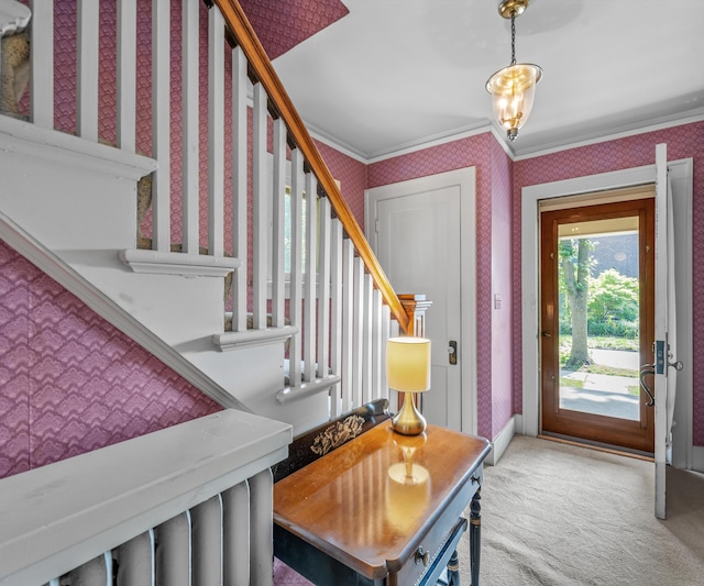 216 Kenwood Ave, Ann Arbor, MI 48103 - entryway featuring stairway, wallpapered walls, carpet floors, and ornamental molding