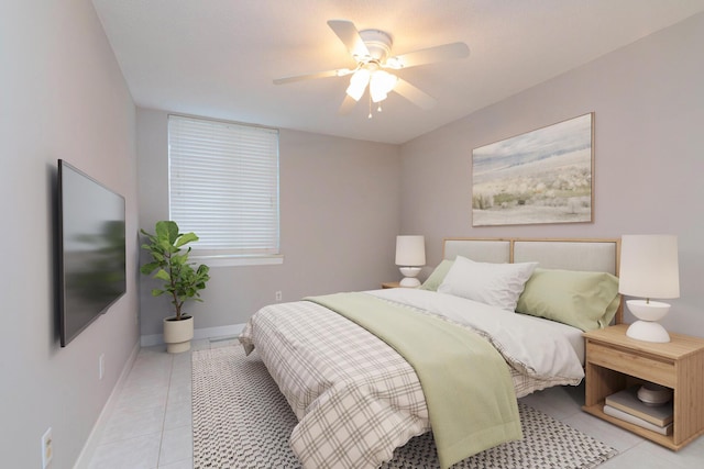 1740 Grove Rd Unit 106, Ypsilanti, MI 48198 - bedroom featuring light tile patterned floors and ceiling fan