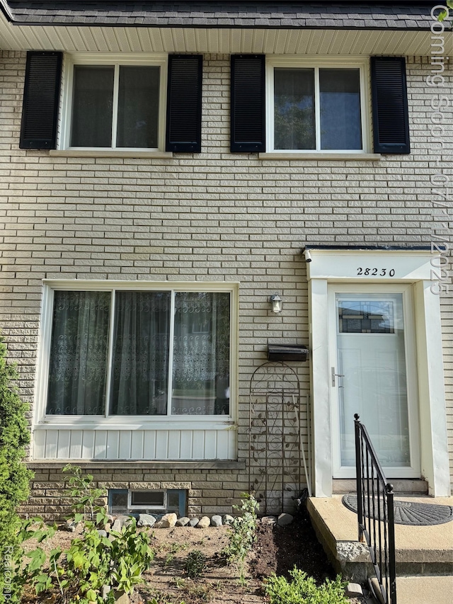 28230 Universal Dr, Warren, MI 48092 - multi unit property featuring brick siding and entry steps
