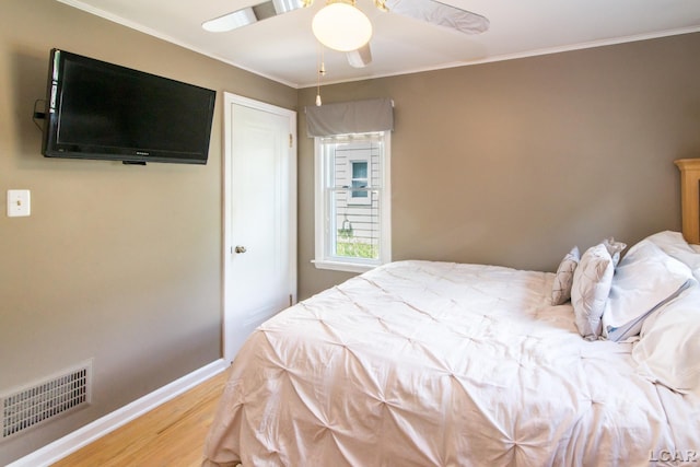 407 Flowerdale St, Ferndale, MI 48220 - bedroom with wood finished floors, ornamental molding, and ceiling fan