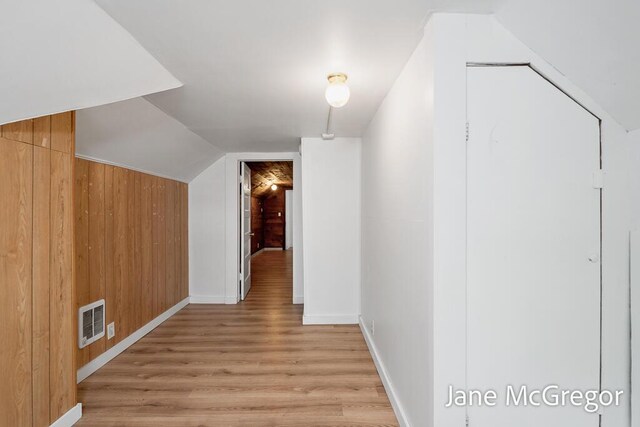 256 W Forest Ave, Muskegon, MI 49441 - bonus room with light wood finished floors, lofted ceiling, and wood walls