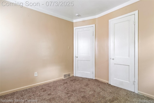 5981 University Pl, Detroit, MI 48224 - unfurnished bedroom featuring carpet flooring and baseboards