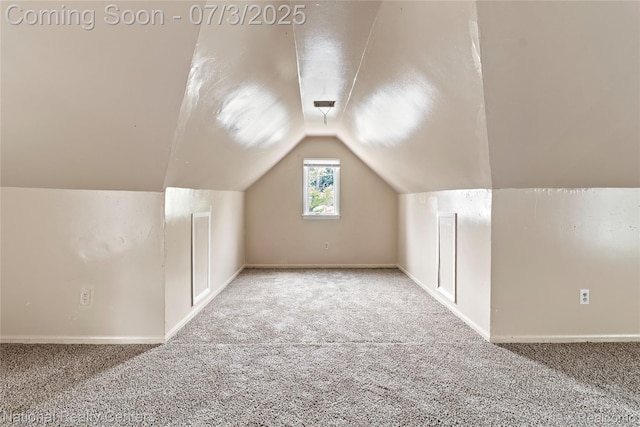 5981 University Pl, Detroit, MI 48224 - additional living space with carpet flooring and vaulted ceiling