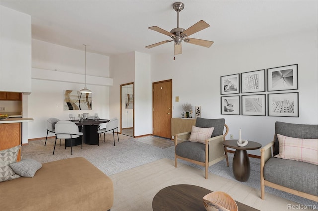 45833 Wildrye Ct, Van Buren, MI 48111 - carpeted living room featuring ceiling fan and high vaulted ceiling