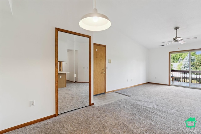 45833 Wildrye Ct, Van Buren, MI 48111 - empty room featuring carpet, ceiling fan, and lofted ceiling