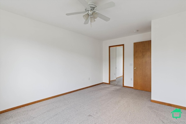 45833 Wildrye Ct, Van Buren, MI 48111 - spare room with light carpet, a ceiling fan, and a smoke detector