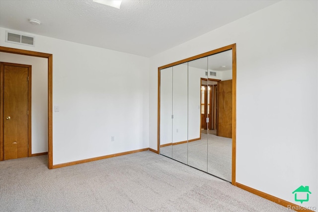 45833 Wildrye Ct, Van Buren, MI 48111 - unfurnished bedroom featuring carpet floors and a closet