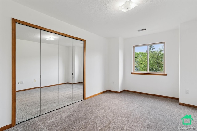45833 Wildrye Ct, Van Buren, MI 48111 - unfurnished bedroom with carpet floors and a closet