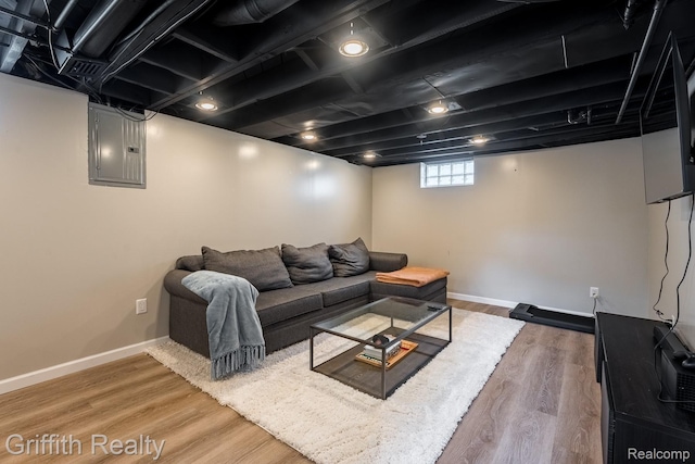 2001 Brockton Ave, Royal Oak, MI 48067 - living room featuring electric panel and wood finished floors