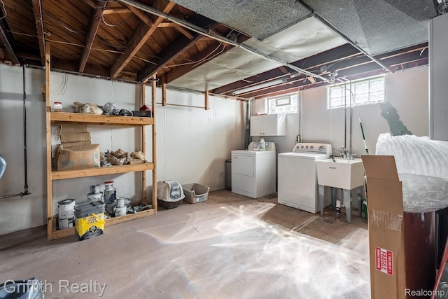 2001 Brockton Ave, Royal Oak, MI 48067 - below grade area with washer and clothes dryer and a sink
