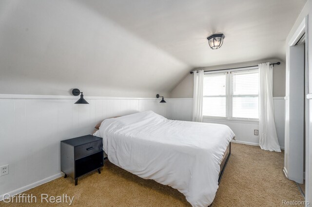2001 Brockton Ave, Royal Oak, MI 48067 - carpeted bedroom with vaulted ceiling and wainscoting