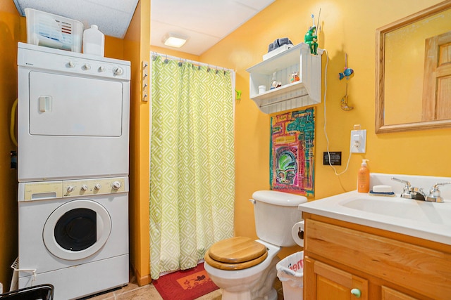9191 W Ranger Rd, Mears, MI 49436 - full bathroom featuring estacked washer and dryer, vanity, and a shower with curtain