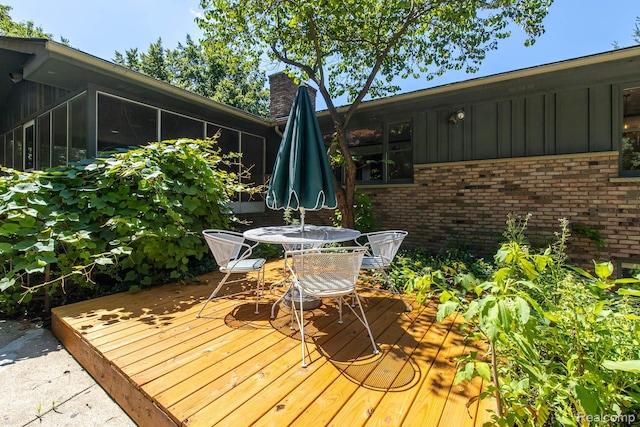 6674 Balmoral Ter, Clarkston, MI 48346 - wooden deck with outdoor dining area