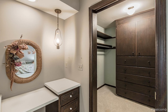 6674 Balmoral Ter, Clarkston, MI 48346 - walk in closet featuring light carpet