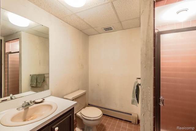 6674 Balmoral Ter, Clarkston, MI 48346 - bathroom with baseboard heating, a paneled ceiling, vanity, an enclosed shower, and tile patterned flooring