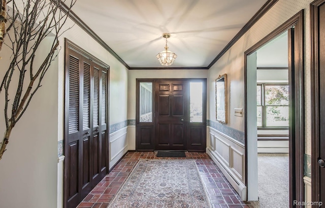 6674 Balmoral Ter, Clarkston, MI 48346 - foyer featuring brick floors, a chandelier, ornamental molding, a baseboard radiator, and a wainscoted wall
