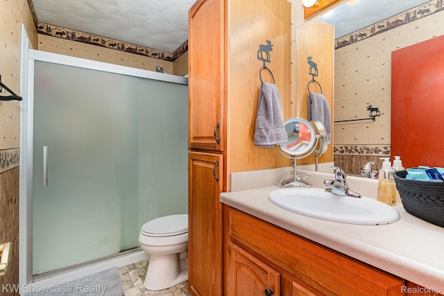 699 W Cherry Creek Rd, Mio, MI 48647 - bathroom featuring vanity, a stall shower, and wallpapered walls