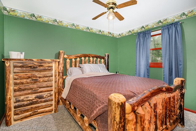 699 W Cherry Creek Rd, Mio, MI 48647 - bedroom featuring carpet and a ceiling fan